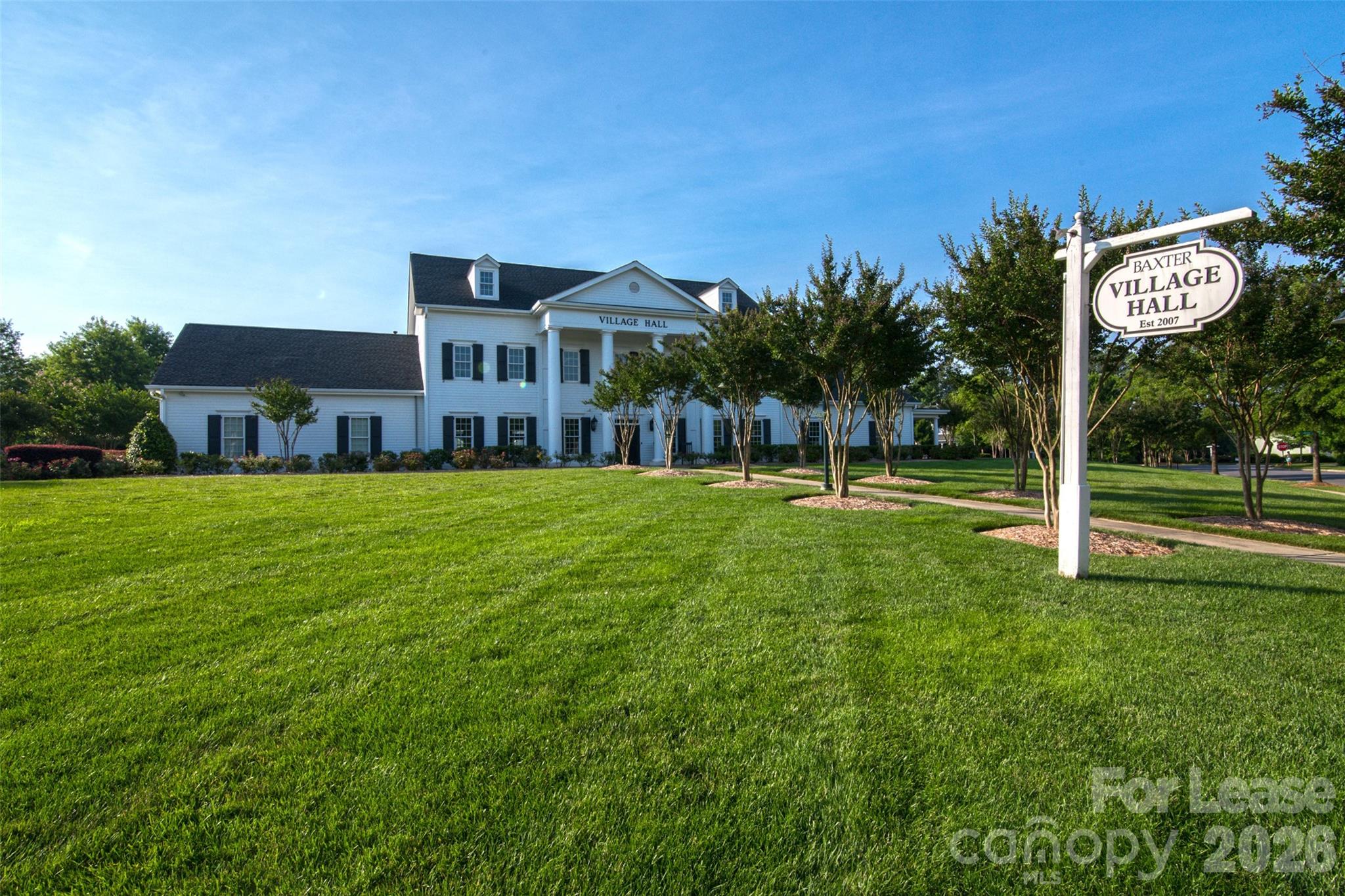 886 Promenade Walk Fort Mill, SC 29708 - Photo 3 of 14 a view of a big house with a big yard and palm trees