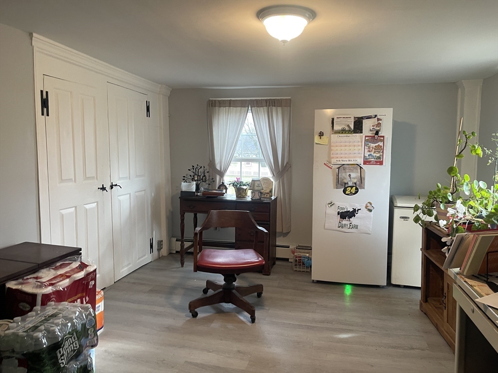 70 Wheaton Avenue Rehoboth, MA 02769 - Photo 19 of 42 a living room with furniture and a window