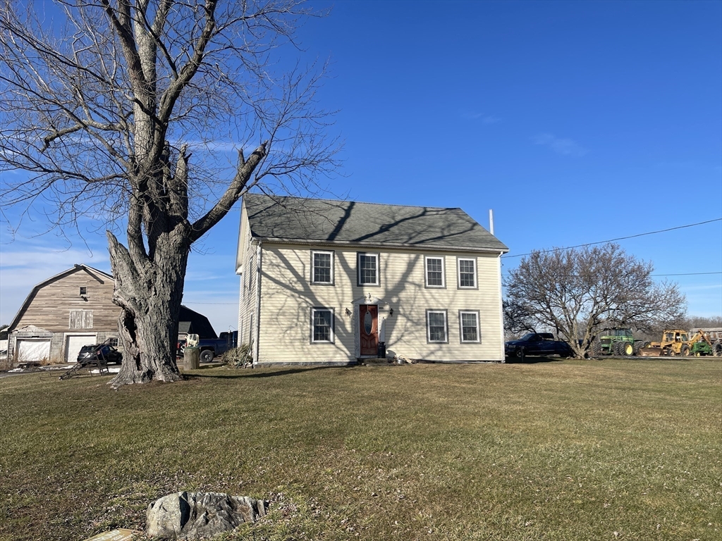 70 Wheaton Avenue Rehoboth, MA 02769 - Photo 5 of 42 a view of a house with a yard