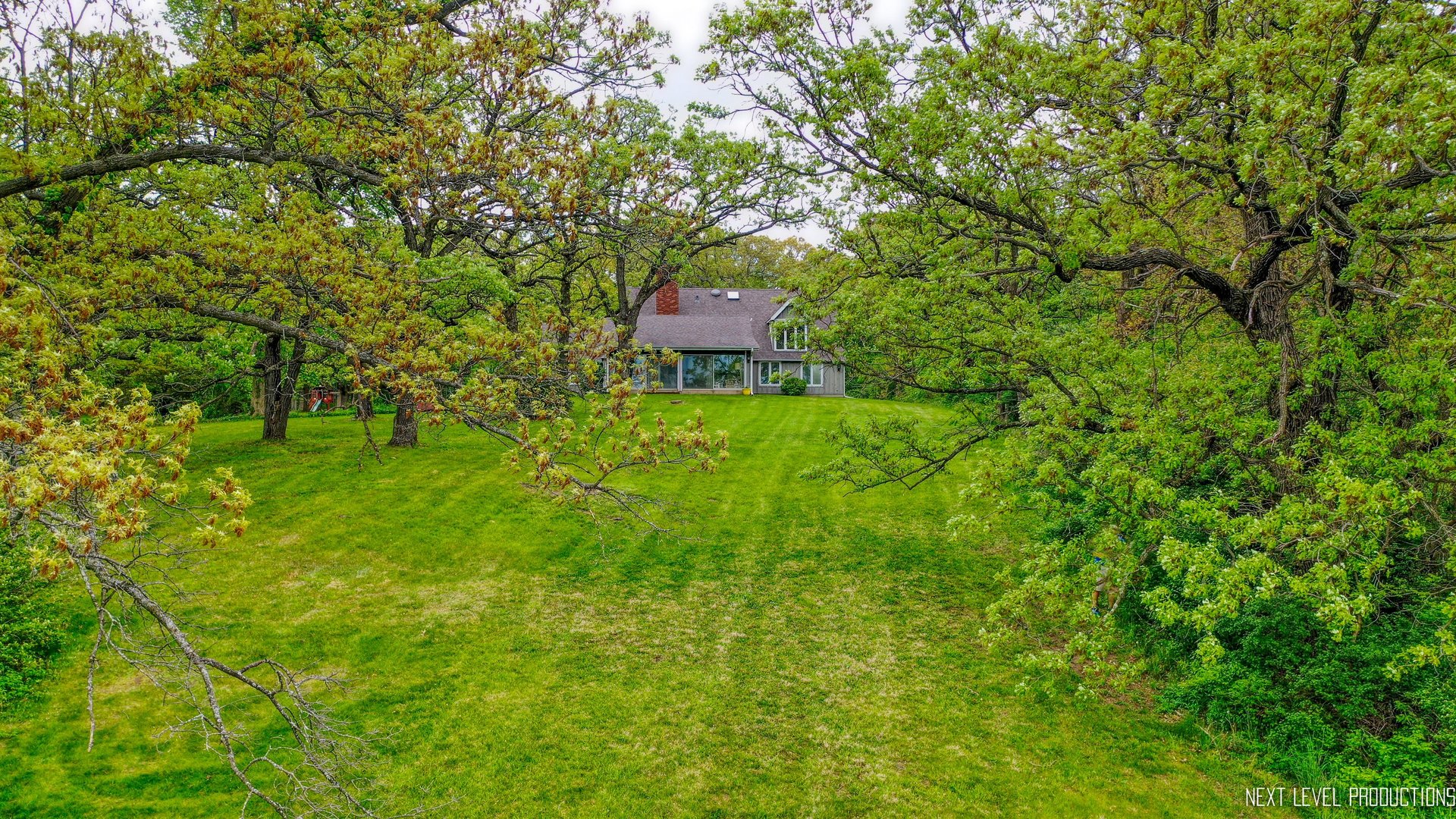 41W898 Beith Road Elburn, IL 60119 - Photo 13 of 82 a backyard of a house with a garden and plants