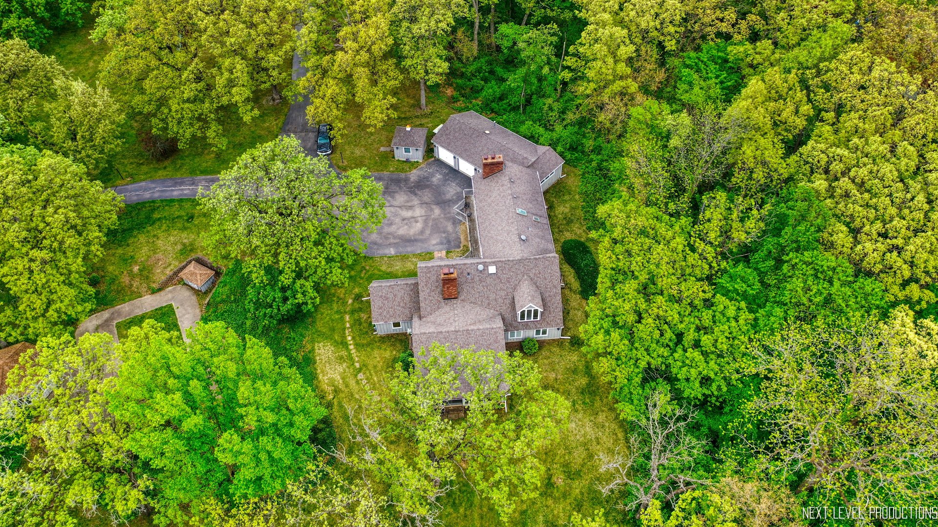 41W898 Beith Road Elburn, IL 60119 - Photo 14 of 82 an aerial view of a house with a yard and large trees