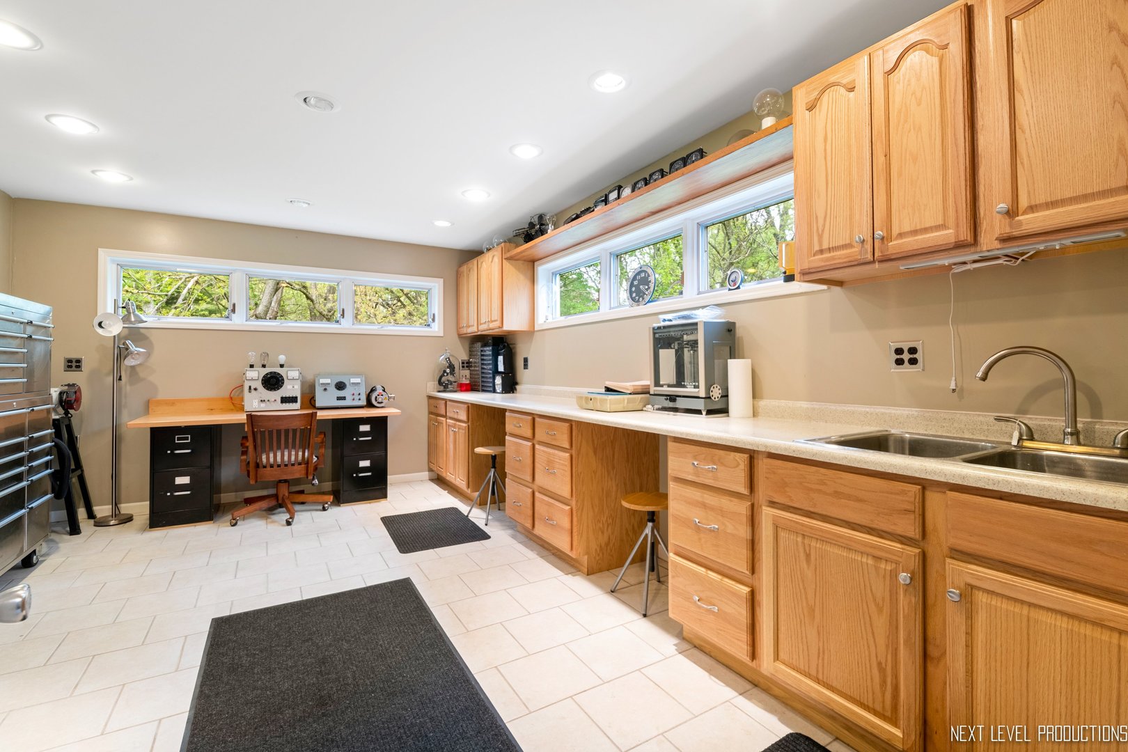 41W898 Beith Road Elburn, IL 60119 - Photo 49 of 82 a kitchen with stainless steel appliances granite countertop a sink and cabinets