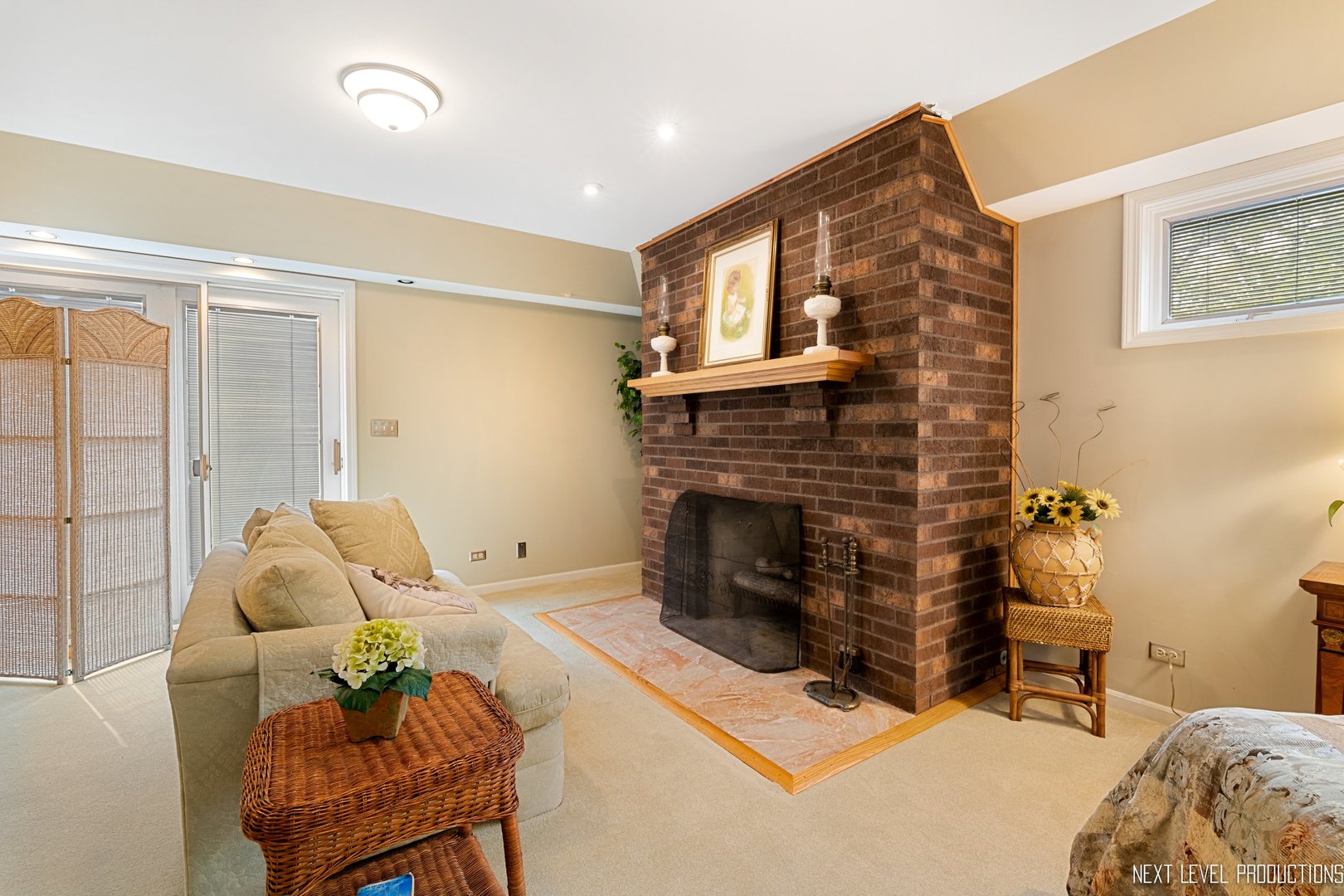 41W898 Beith Road Elburn, IL 60119 - Photo 52 of 82 a living room with furniture and a fireplace