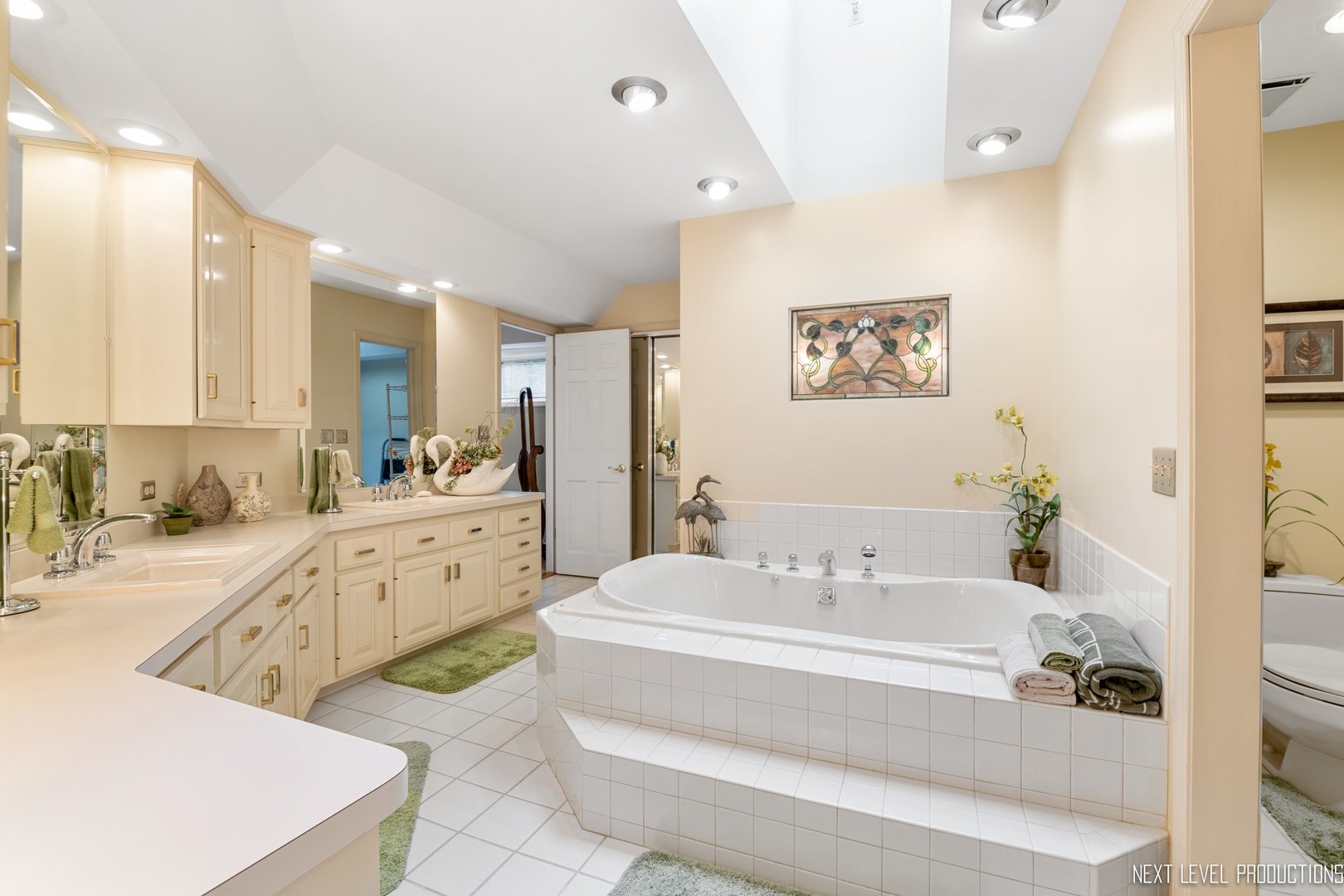 41W898 Beith Road Elburn, IL 60119 - Photo 54 of 82 a spacious bathroom with a tub sink and mirror