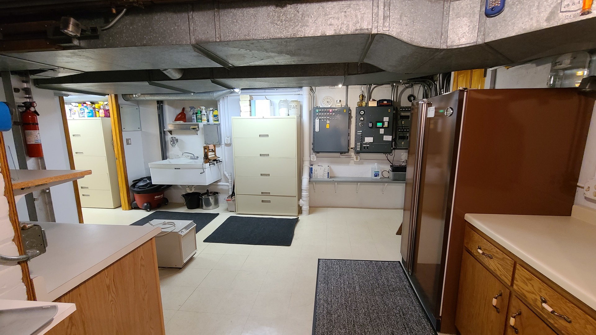 41W898 Beith Road Elburn, IL 60119 - Photo 60 of 82 a kitchen with stainless steel appliances kitchen island a refrigerator and a stove
