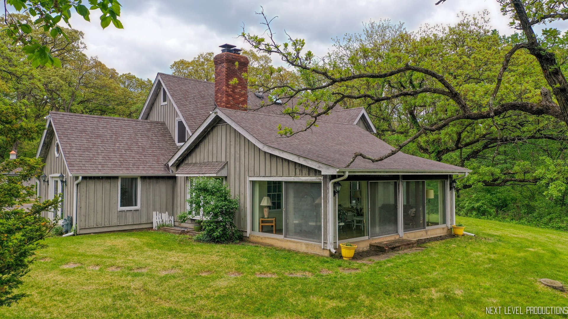 41W898 Beith Road Elburn, IL 60119 - Photo 9 of 82 a view of a house with a yard plants and large tree
