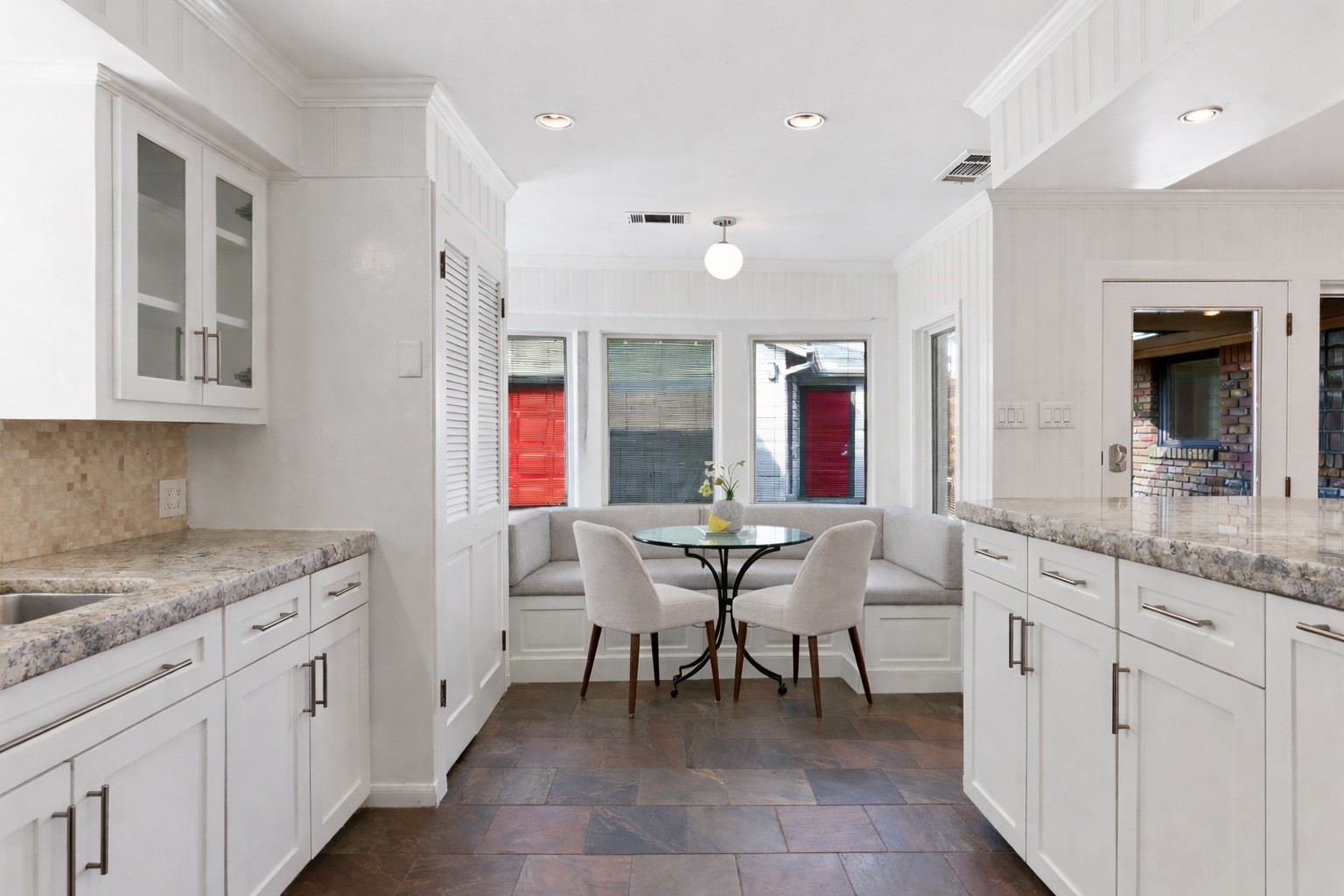 531 Azaleadell Drive Houston, TX 77018 - Photo 8 of 37 a view of a kitchen area with furniture and wooden floor