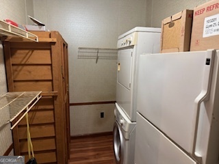 1572 Triple T Drive Dewy Rose, GA 30634 - Photo 7 of 18 a utility room with dryer and washer