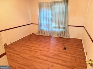 1572 Triple T Drive Dewy Rose, GA 30634 - Photo 10 of 18 a view of balcony with floor to ceiling windows