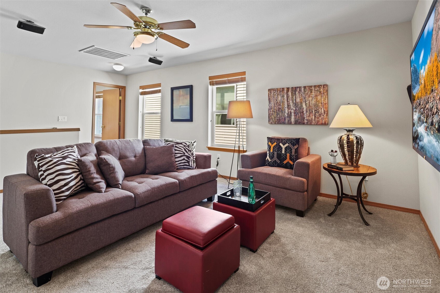 19002 13th Avenue Southeast Bothell, WA 98012 - Photo 16 of 36 a living room with furniture a rug and a window