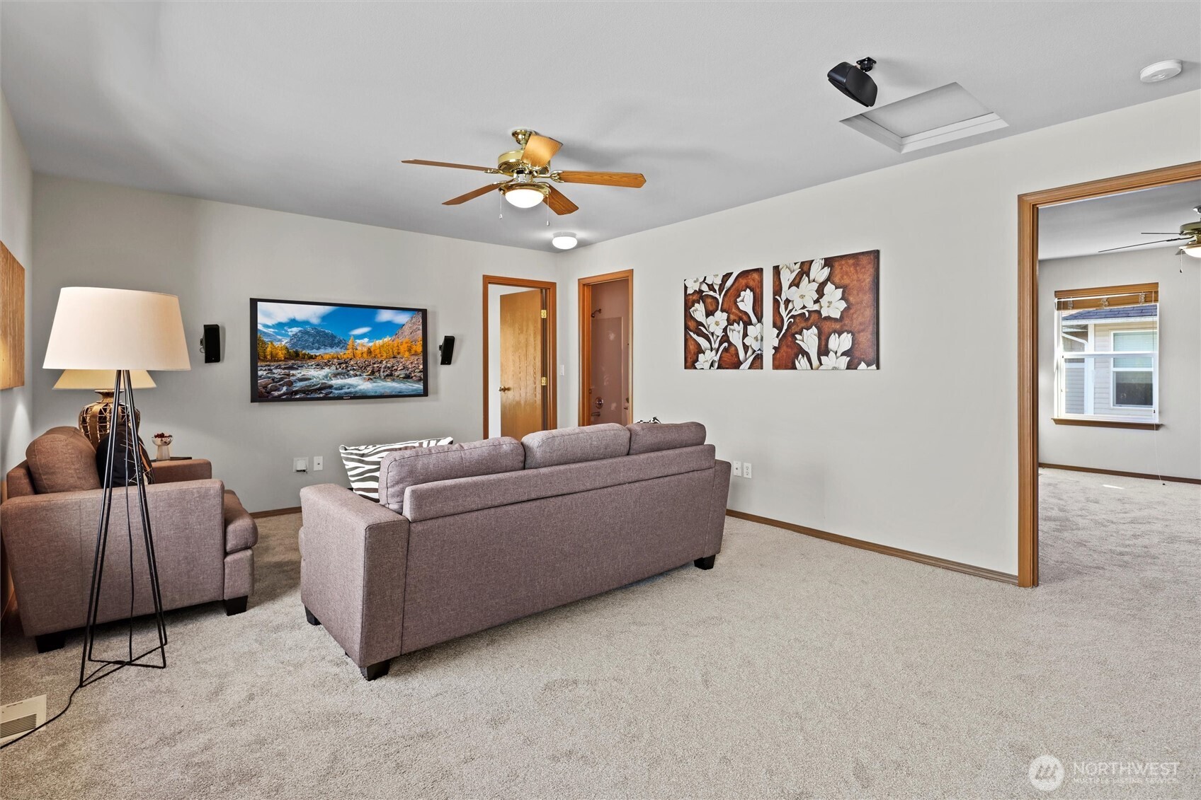 19002 13th Avenue Southeast Bothell, WA 98012 - Photo 17 of 36 a living room with furniture and a flat screen tv