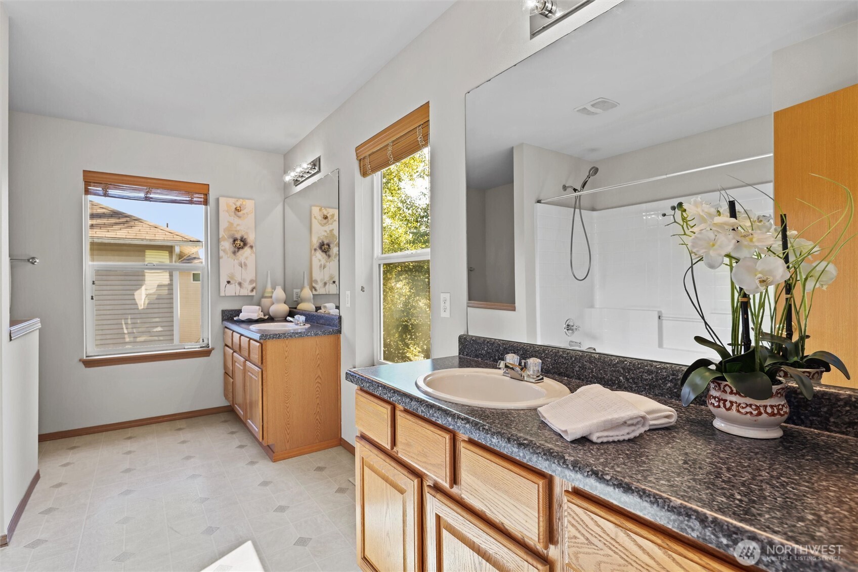 19002 13th Avenue Southeast Bothell, WA 98012 - Photo 20 of 36 a bath room with sink and mirror