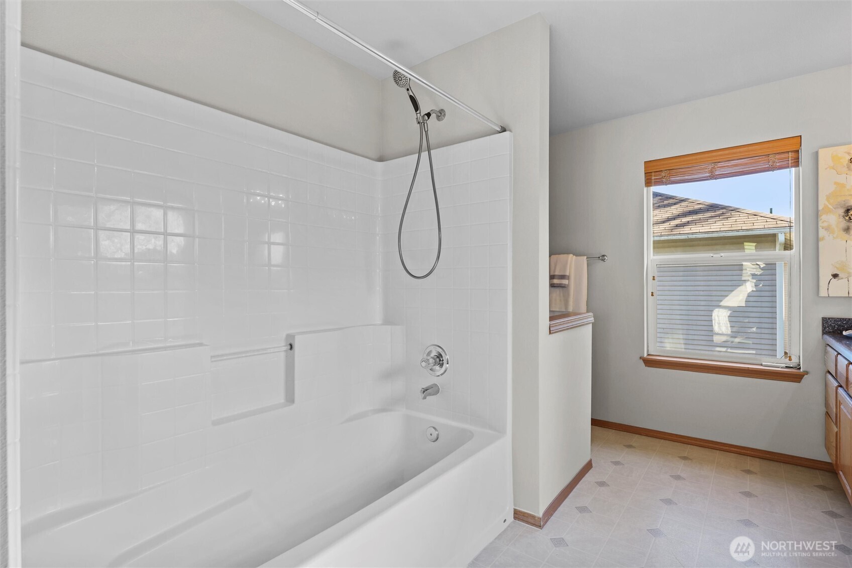 19002 13th Avenue Southeast Bothell, WA 98012 - Photo 22 of 36 a bathroom with a bathtub and a shower