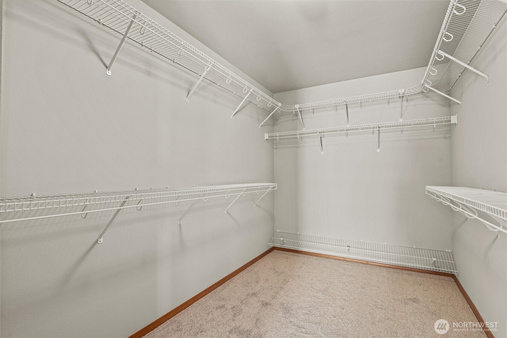 19002 13th Avenue Southeast Bothell, WA 98012 - Photo 23 of 36 a view of a room with racks on the wall