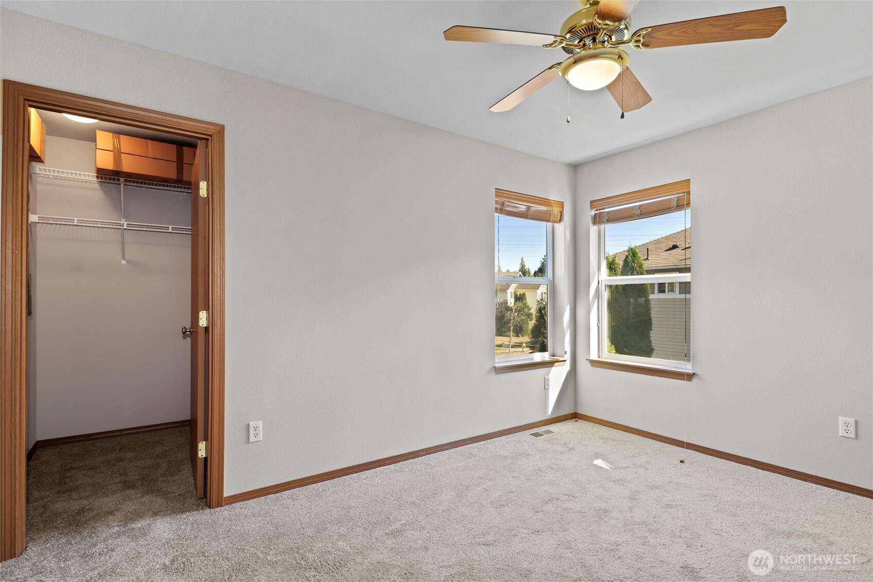 19002 13th Avenue Southeast Bothell, WA 98012 - Photo 26 of 36 an empty room with a window and a chandelier fan