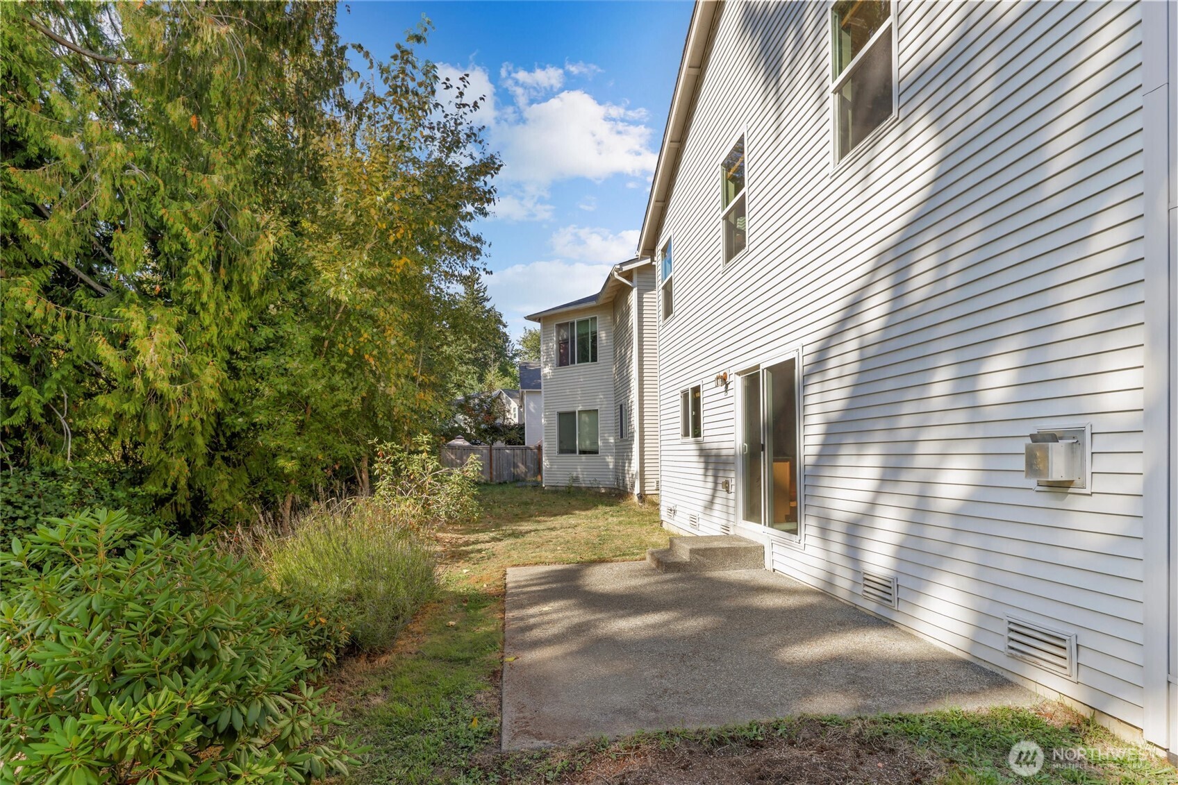 19002 13th Avenue Southeast Bothell, WA 98012 - Photo 28 of 36 a view of a back yard of the house