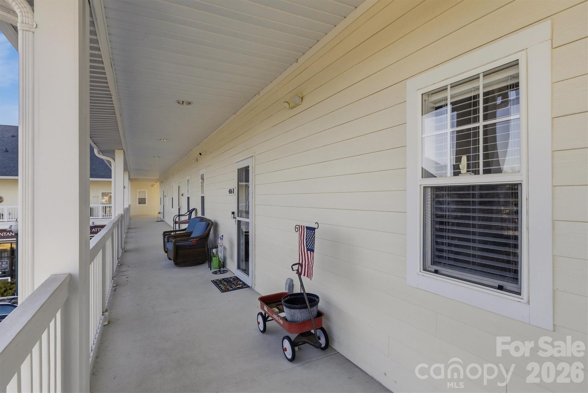 406 East Union Street Morganton, NC 28655 - Photo 20 of 23 a living room with furniture and a window