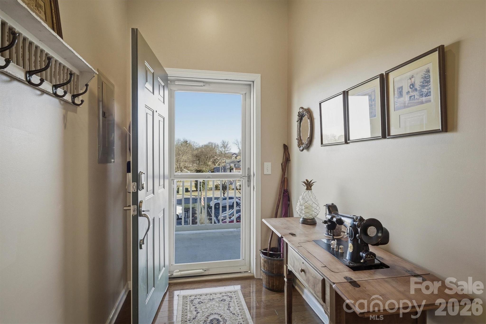 406 East Union Street Morganton, NC 28655 - Photo 2 of 23 a view of workspace with wooden floor and furniture