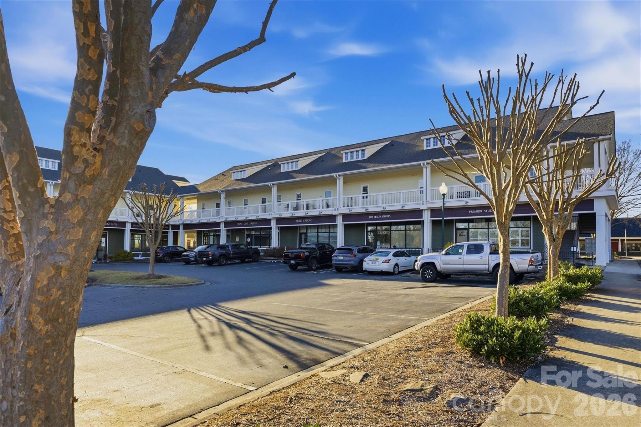 406 East Union Street Morganton, NC 28655 - Photo 21 of 23 a view of a building with a fountain in a patio