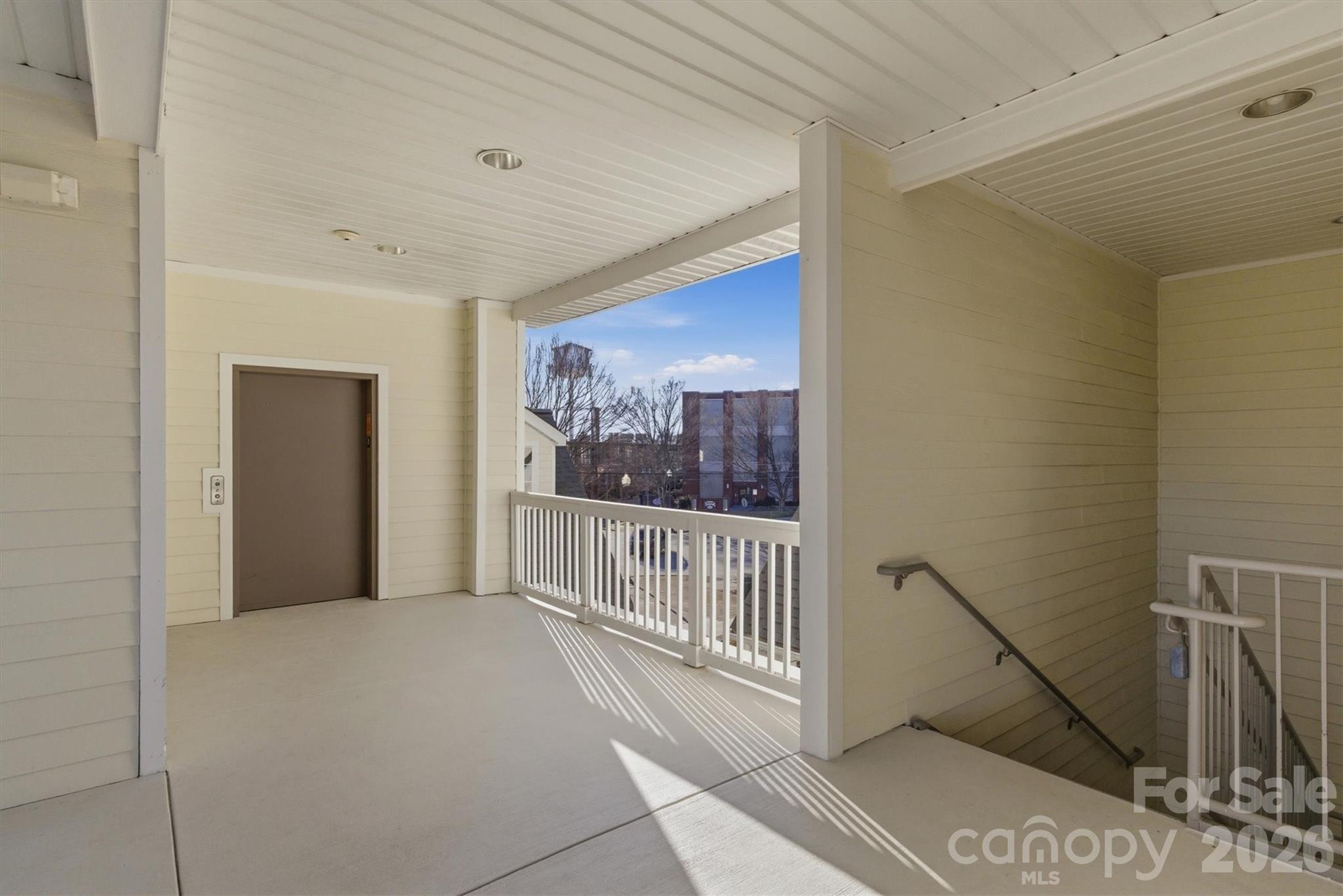 406 East Union Street Morganton, NC 28655 - Photo 23 of 23 a view of a hallway with a chandelier and entryway