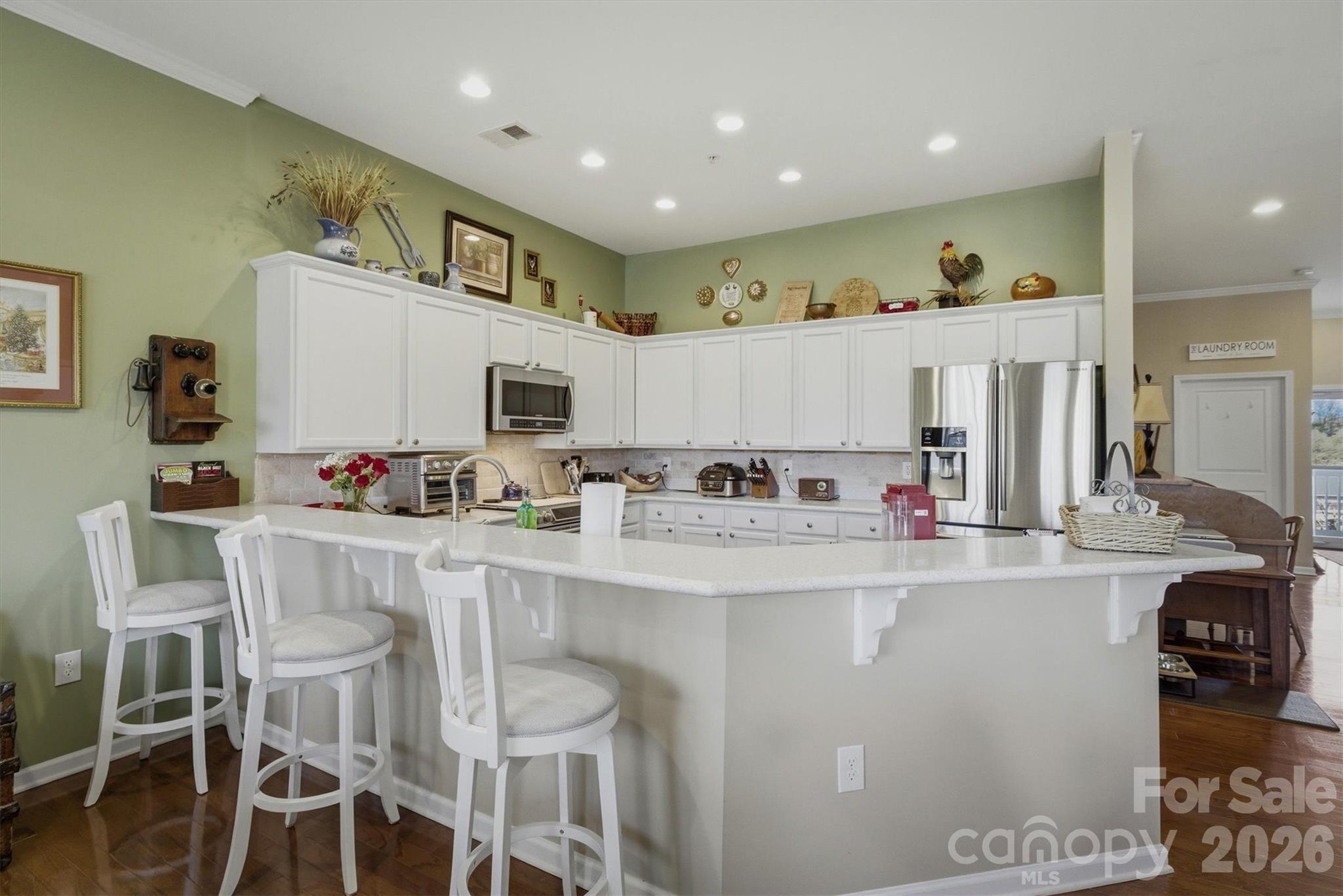 406 East Union Street Morganton, NC 28655 - Photo 8 of 23 a large kitchen with lots of counter space and windows