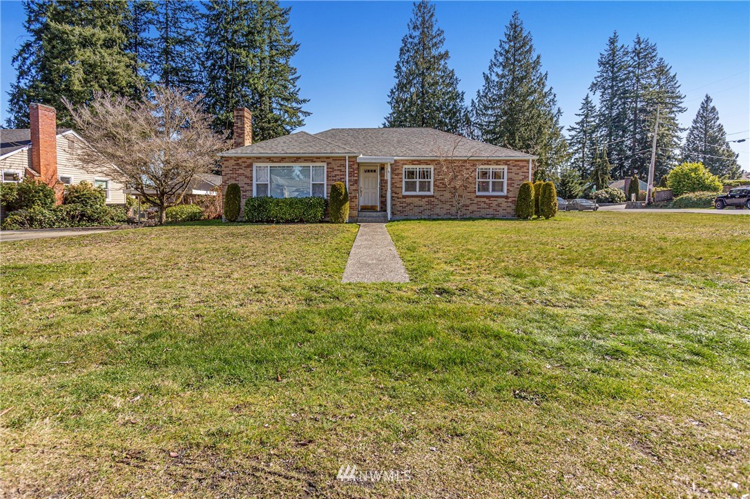 7011 Cady Road Everett, WA 98203 - Photo 1 of 32 a front view of a house with a yard