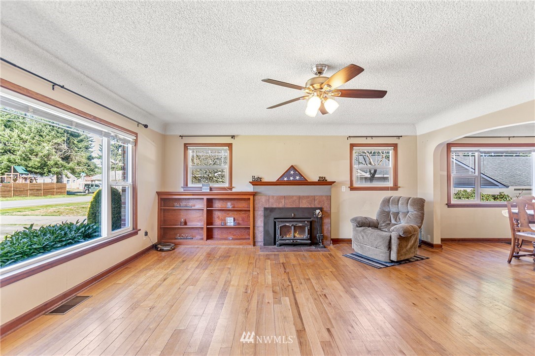 7011 Cady Road Everett, WA 98203 - Photo 13 of 32 a living room with furniture and a fireplace
