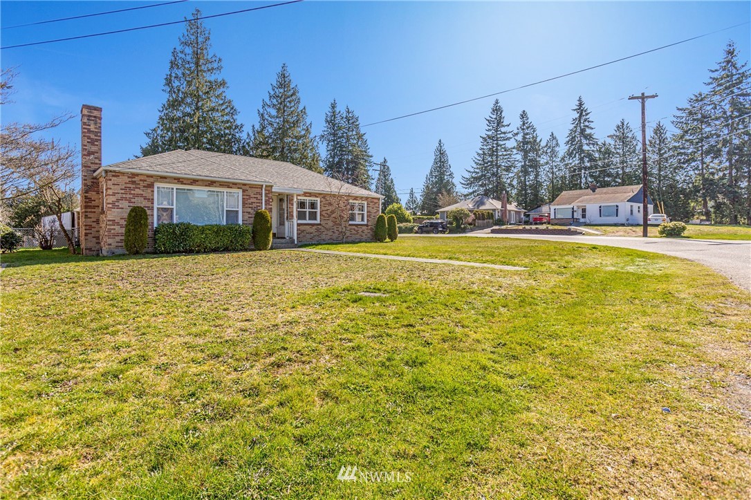 7011 Cady Road Everett, WA 98203 - Photo 3 of 32 a view of a house with a yard