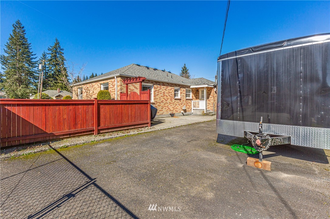7011 Cady Road Everett, WA 98203 - Photo 31 of 32 a view of a backyard with a patio