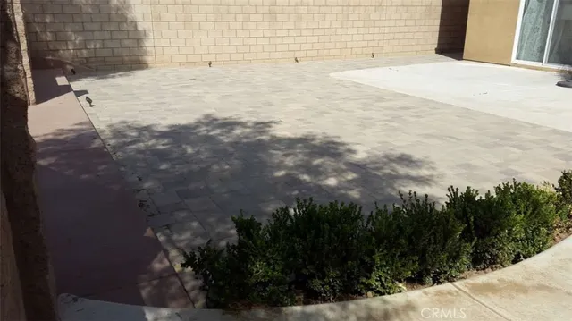 a view of a backyard of the house