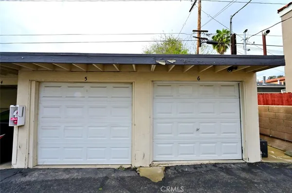 front view of a house with a garden