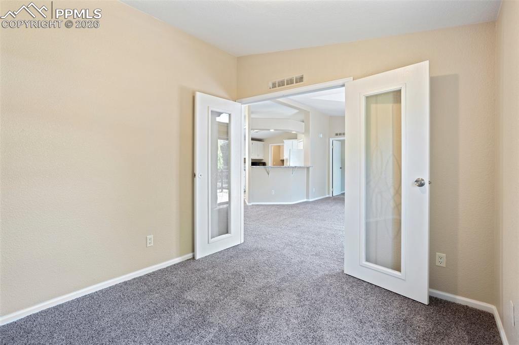 7765 Valley Quail Point Colorado Springs, CO 80922 - Photo 21 of 37 an empty room with a bathroom and a sink