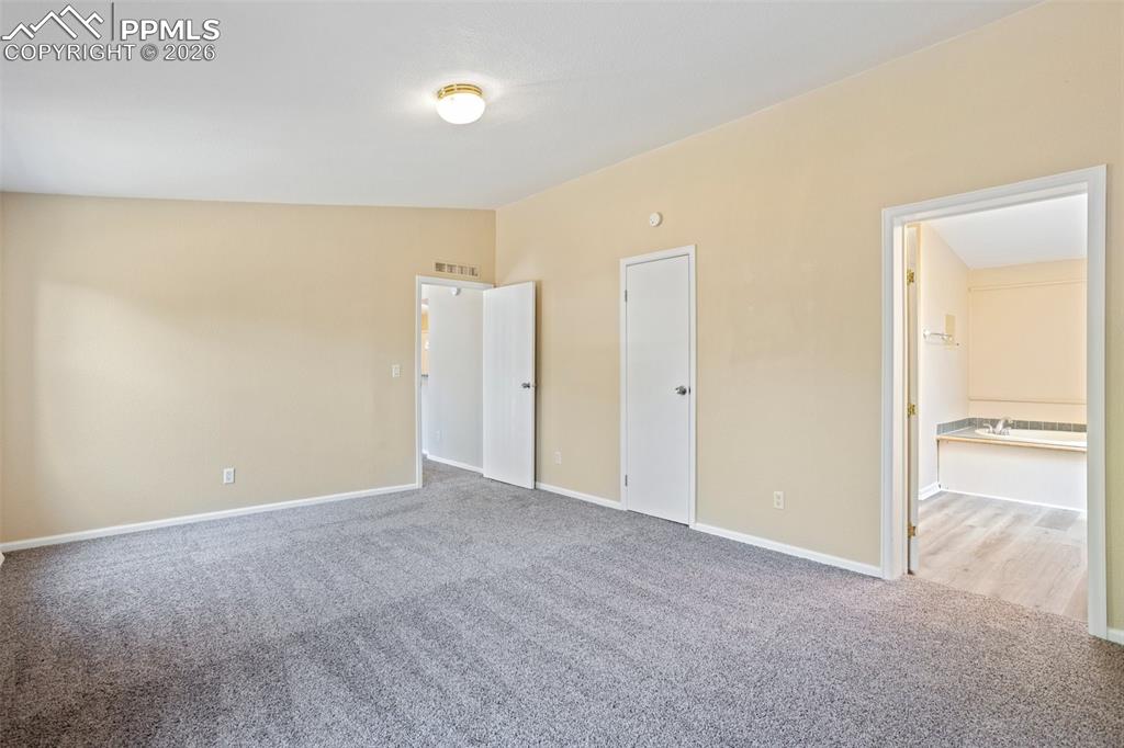 7765 Valley Quail Point Colorado Springs, CO 80922 - Photo 23 of 37 a view of an empty room