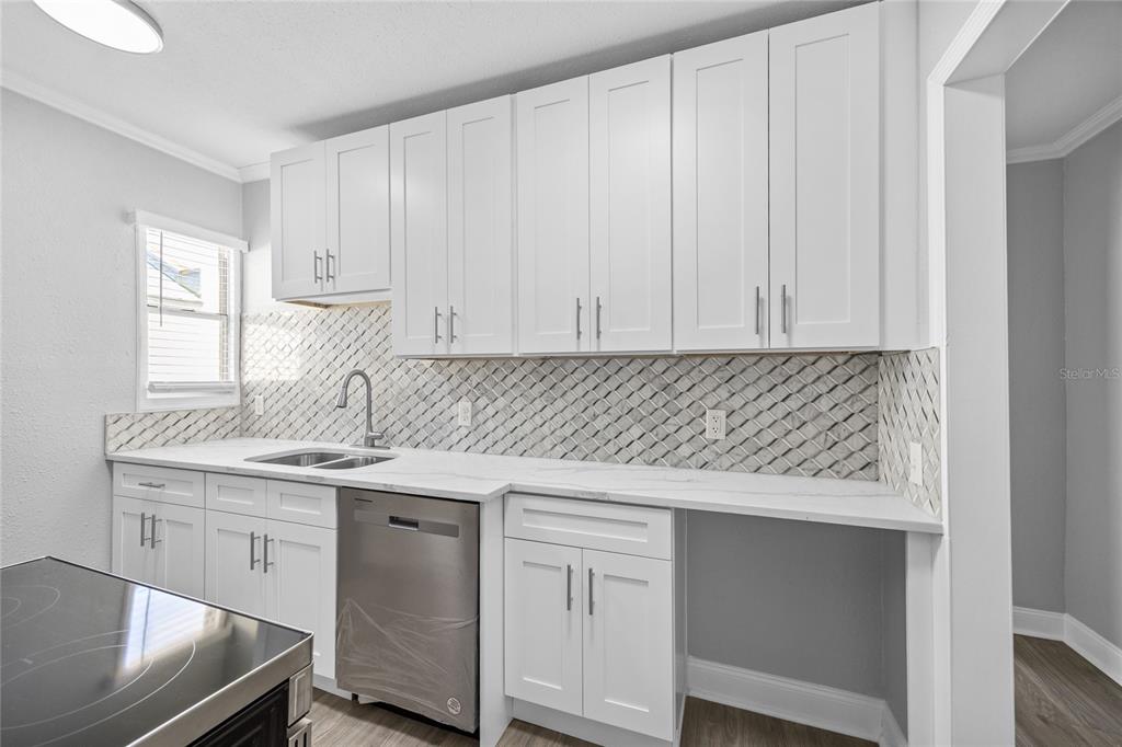 3205 West San Pedro Street, Unit 1 Tampa, FL 33629 - Photo 13 of 35 a kitchen with a sink and cabinets