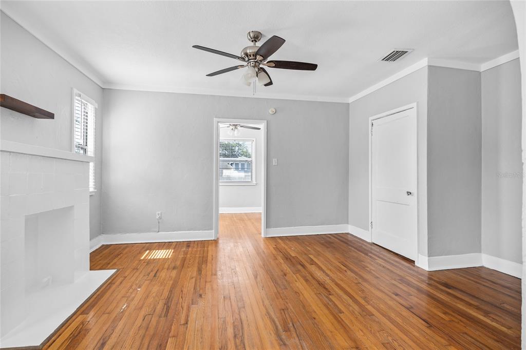 3205 West San Pedro Street, Unit 1 Tampa, FL 33629 - Photo 22 of 35 wooden floor in an empty room with a window