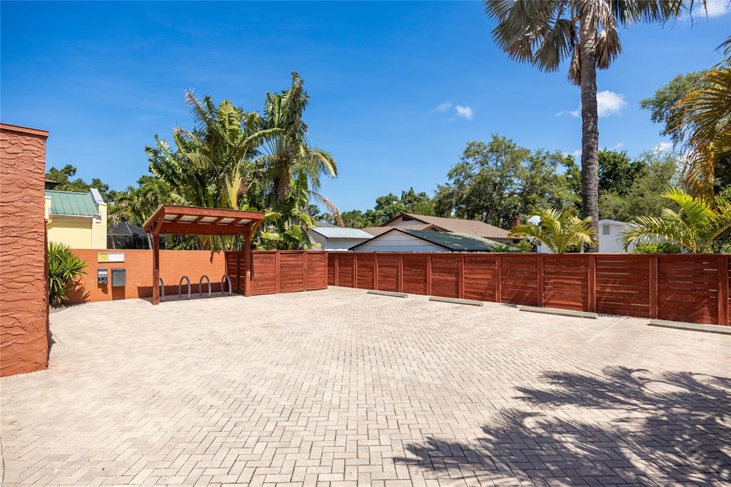 3205 West San Pedro Street, Unit 1 Tampa, FL 33629 - Photo 29 of 35 a yellow house with trees in front of it
