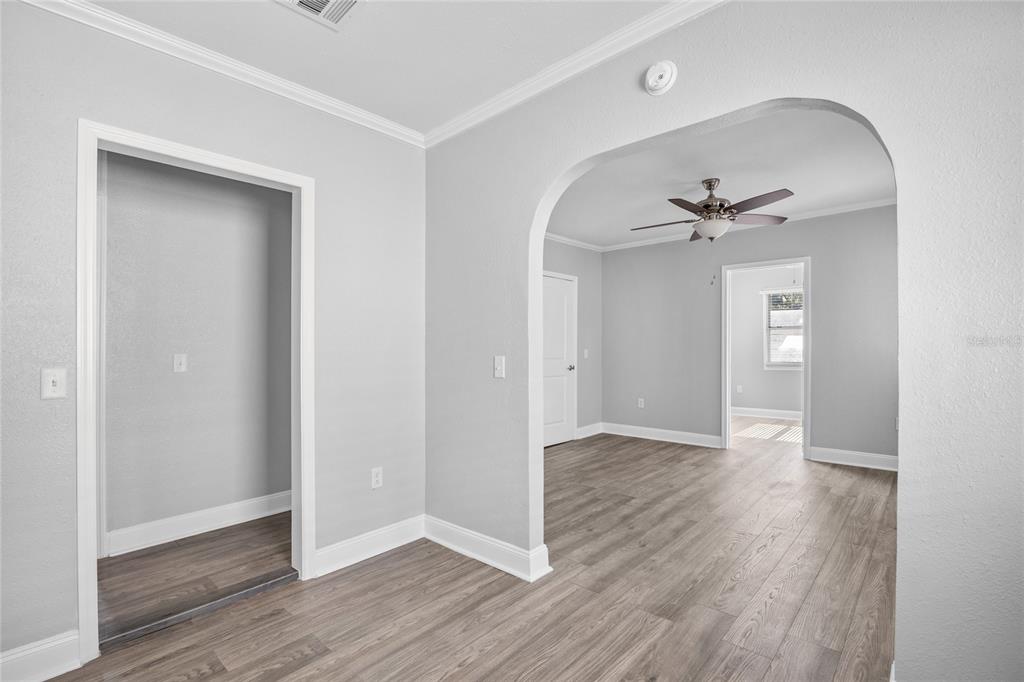 3205 West San Pedro Street, Unit 1 Tampa, FL 33629 - Photo 9 of 35 a view of an empty room with wooden floor