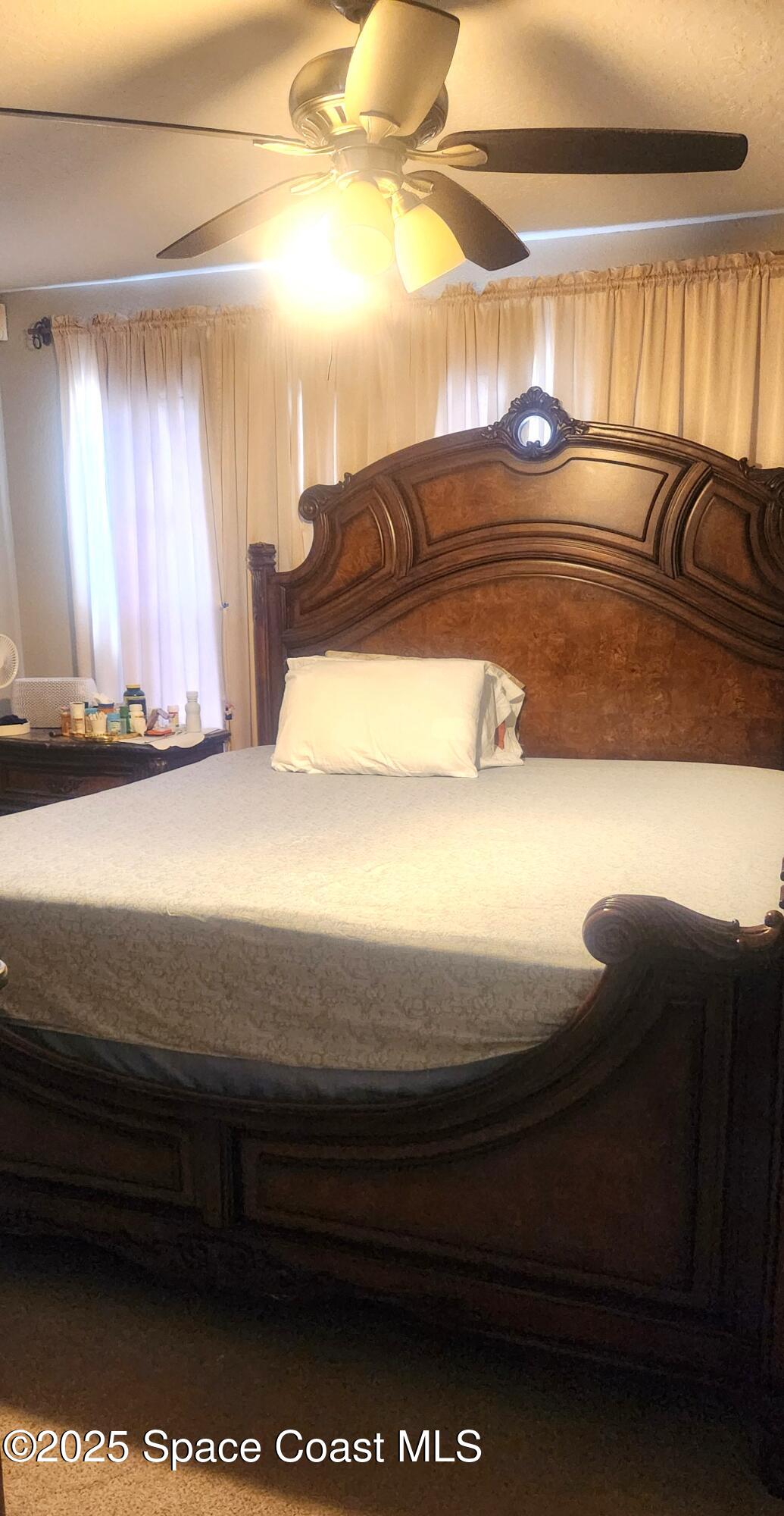 2014 Manor Drive Northeast Palm Bay, FL 32905 - Photo 14 of 15 a bathroom with a bathtub