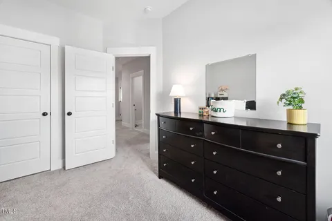 a bathroom with a double vanity sink and mirror