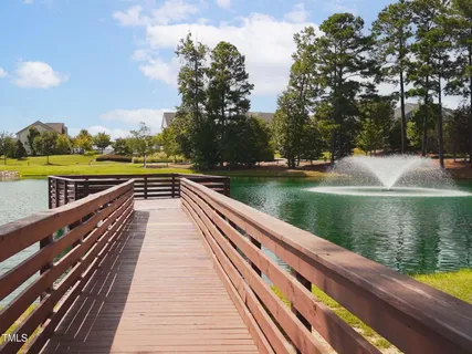 an aerial view of a pool patio swimming pool and outdoor seating