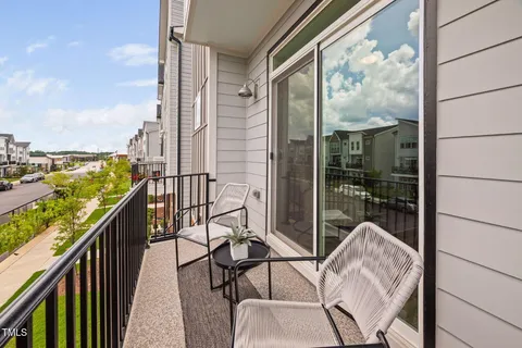 a balcony with view of city from a balcony