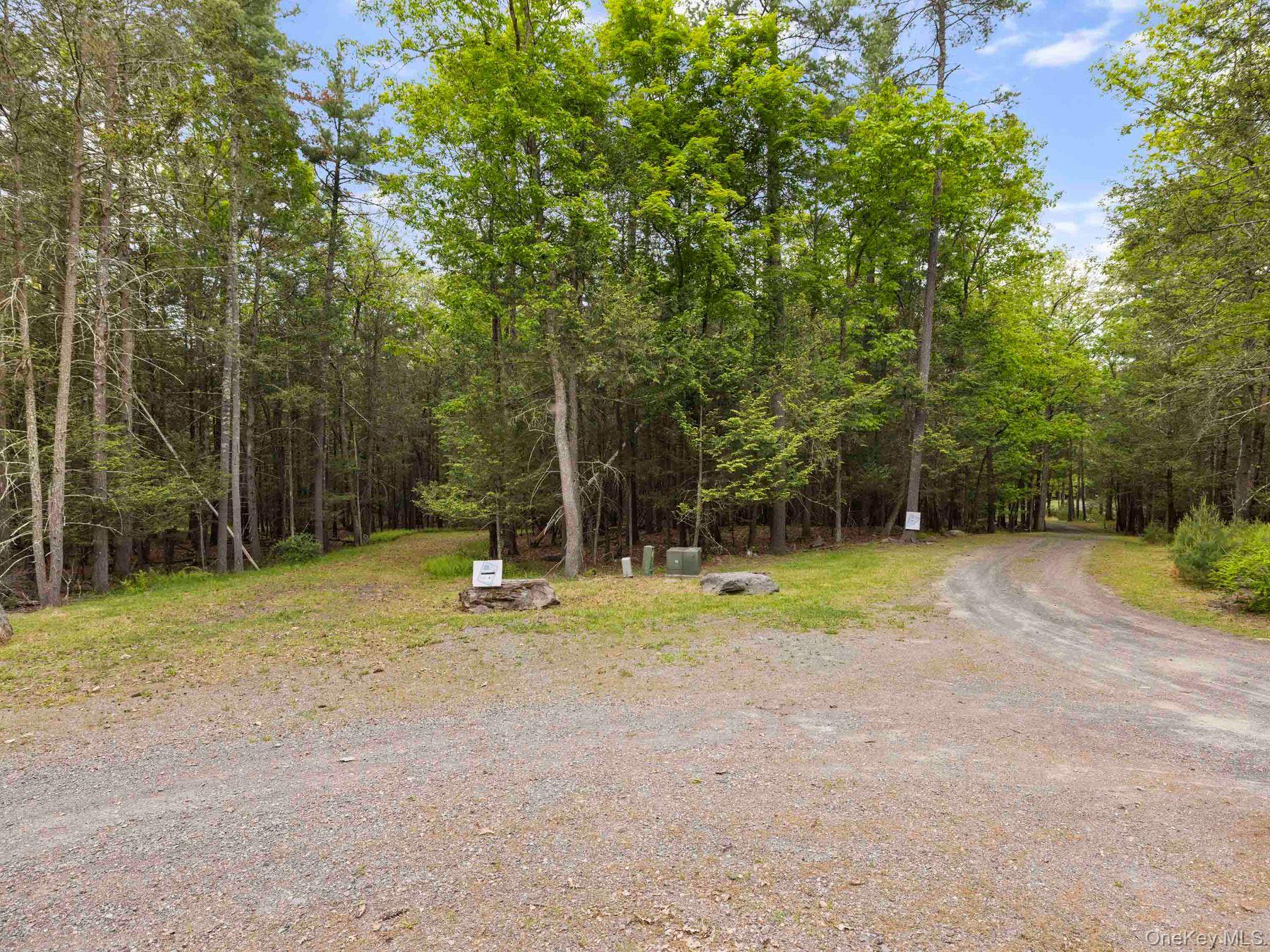 40 Mamoud Hills Road Kingston, NY 12401 - Photo 19 of 42 a view of outdoor space with deck and trees