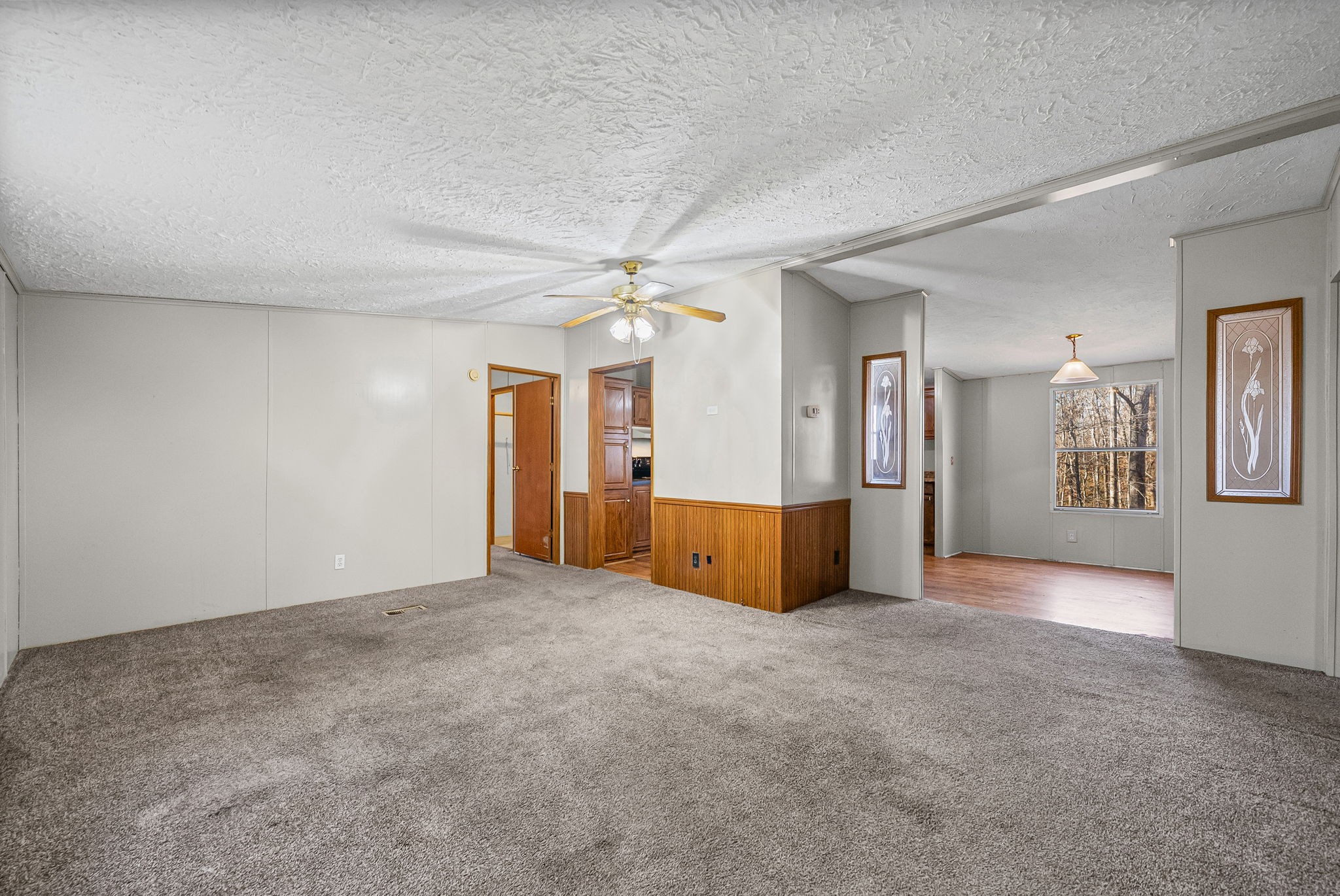 1105 Valley View Road Ashland City, TN 37015 - Photo 1 of 28 an empty room with windows and entrance