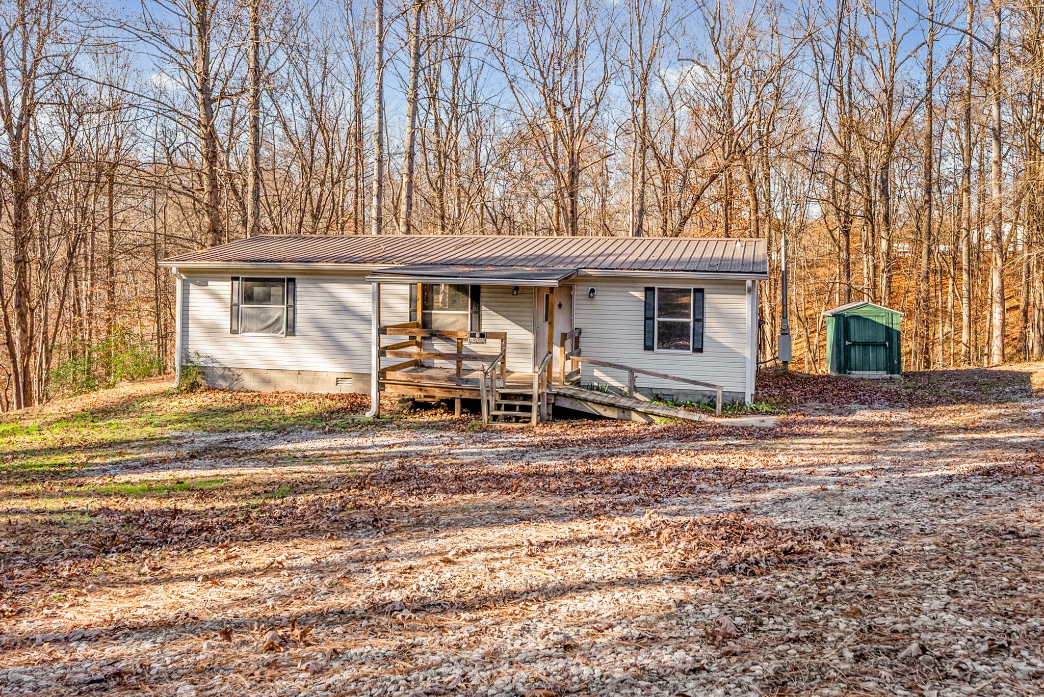 1105 Valley View Road Ashland City, TN 37015 - Photo 25 of 28 a view of a house with backyard and chairs