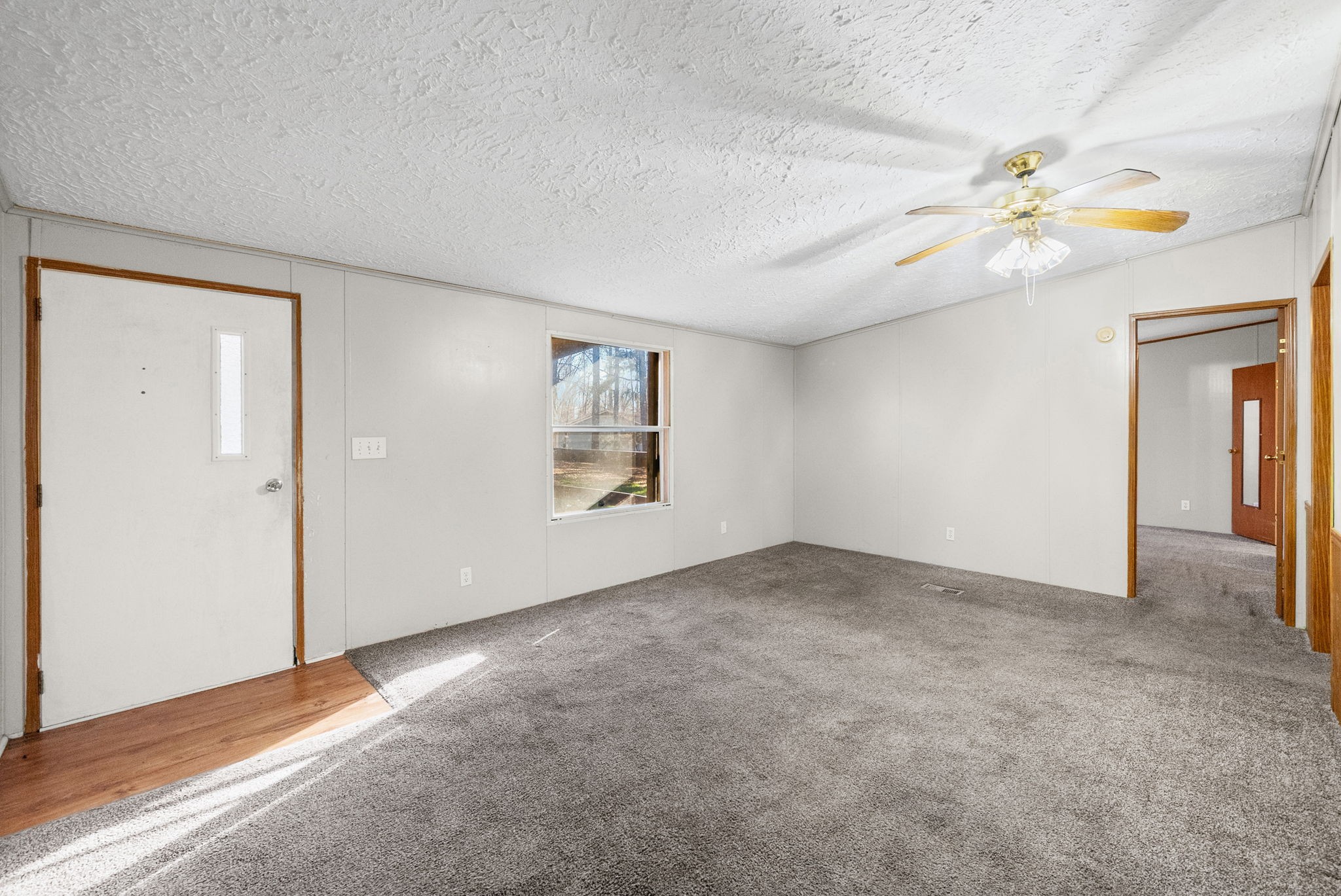 1105 Valley View Road Ashland City, TN 37015 - Photo 5 of 28 an empty room with windows and fan