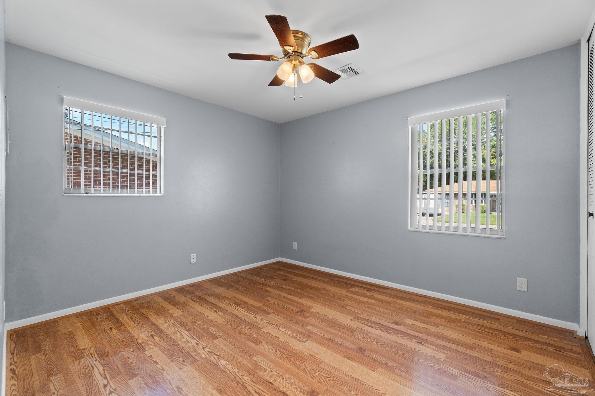 2969 Sky Crest Drive Pensacola, FL 32514 - Photo 20 of 50 a view of an empty room with window and cabinet