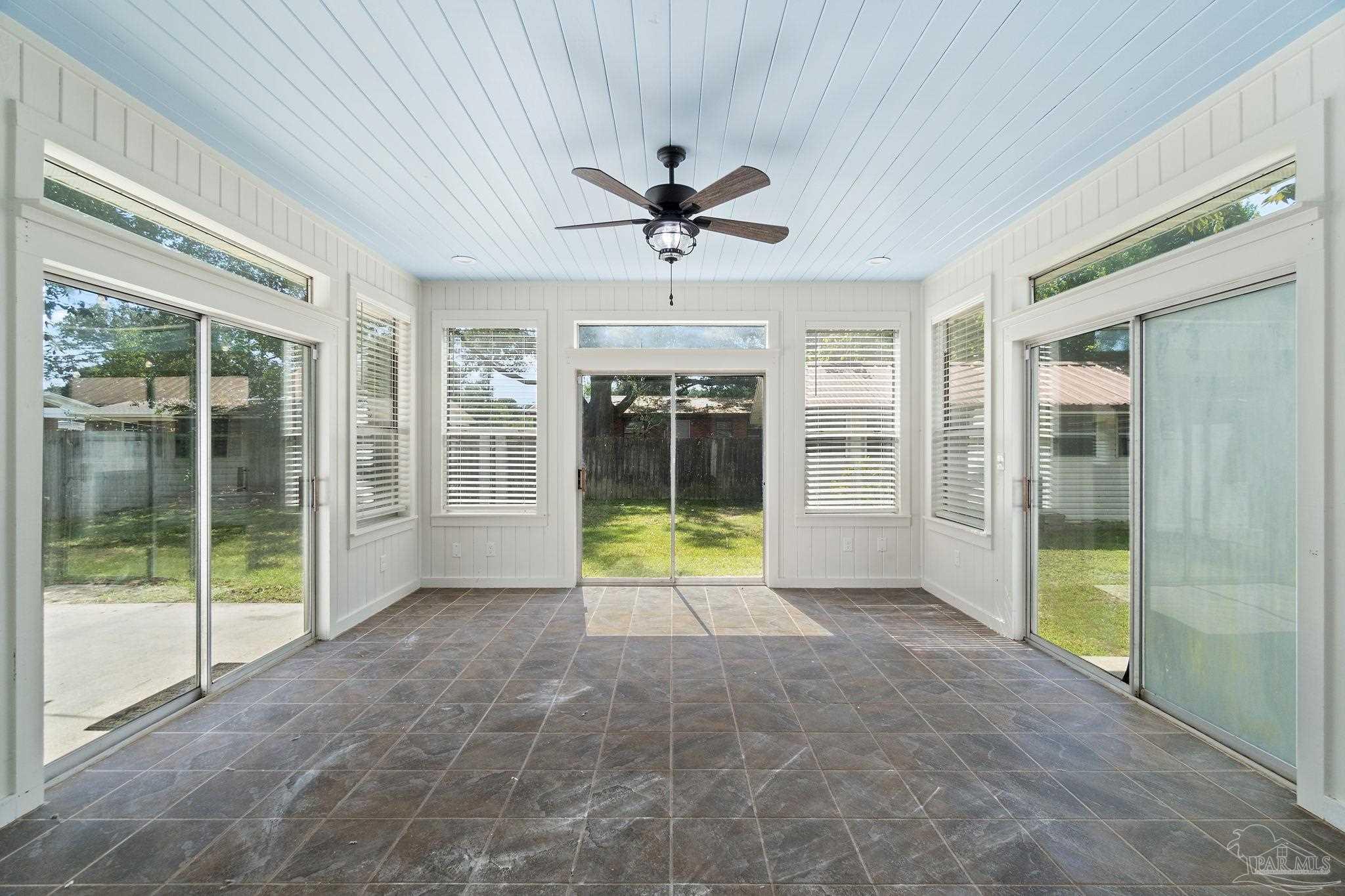 2969 Sky Crest Drive Pensacola, FL 32514 - Photo 26 of 50 a view of a big room with windows