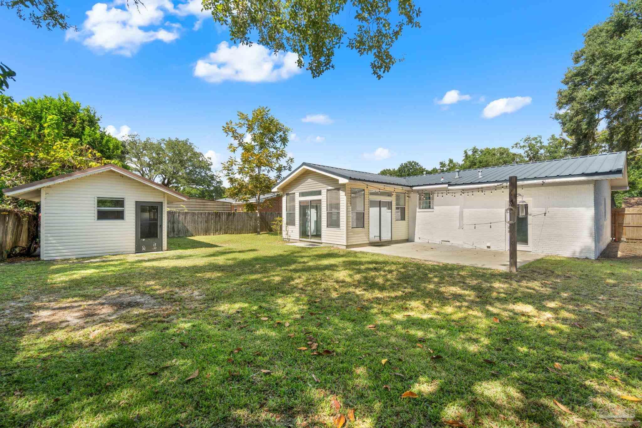2969 Sky Crest Drive Pensacola, FL 32514 - Photo 35 of 50 a view of a house with a backyard