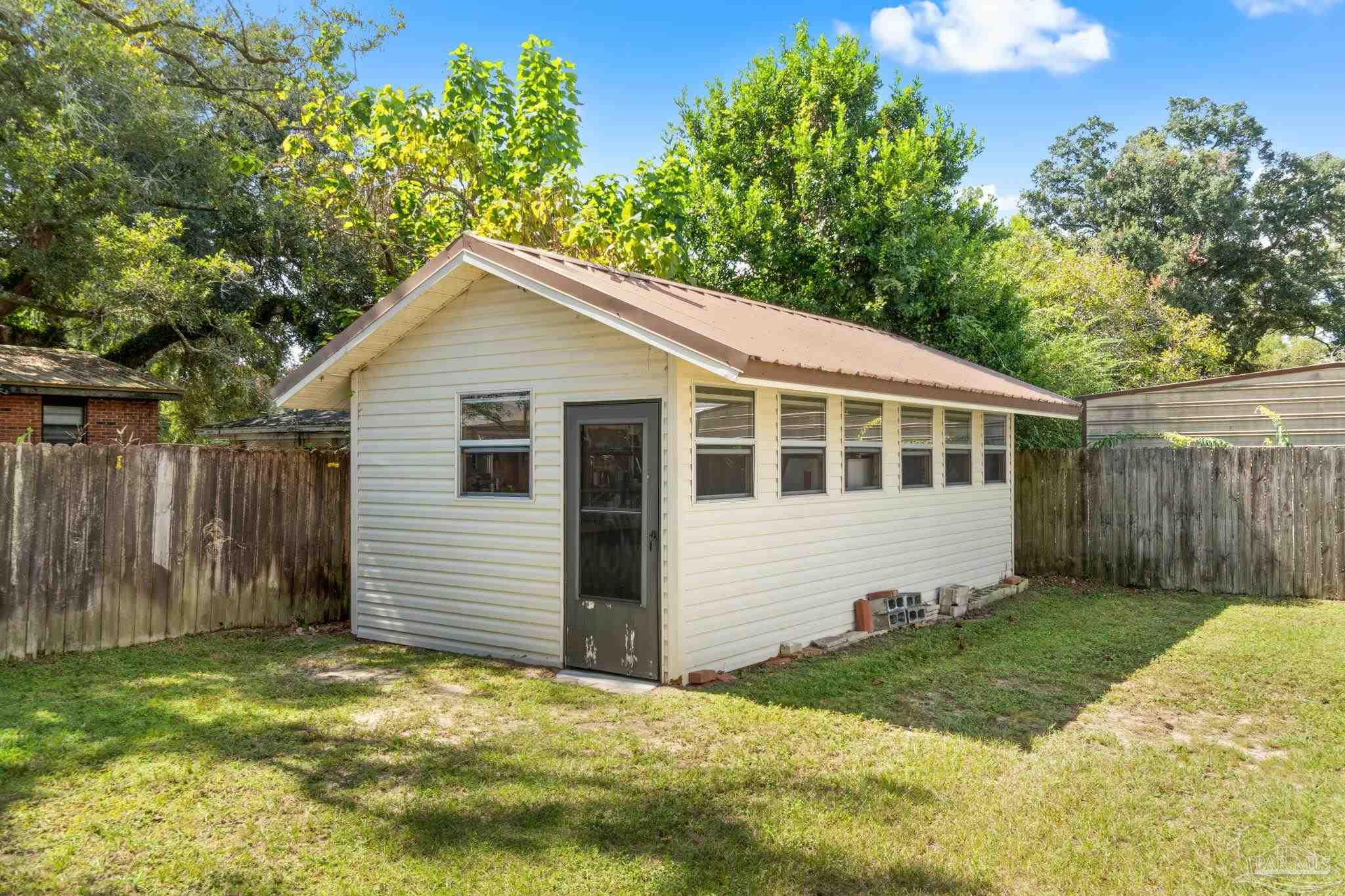 2969 Sky Crest Drive Pensacola, FL 32514 - Photo 36 of 50 a house with a yard