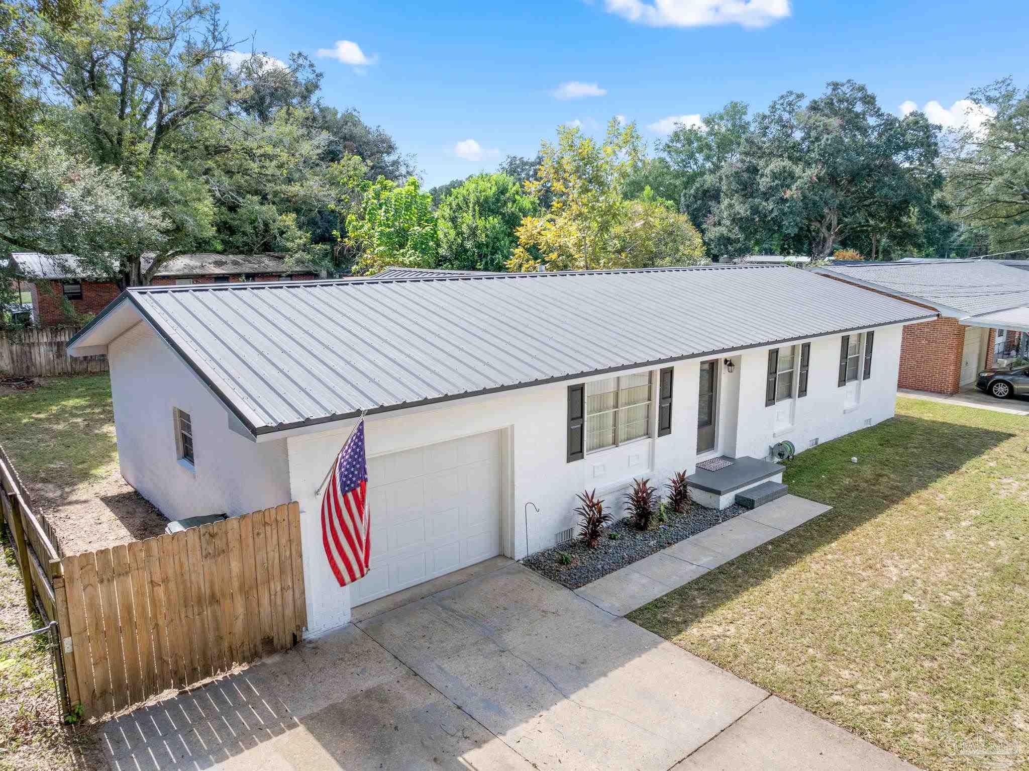 2969 Sky Crest Drive Pensacola, FL 32514 - Photo 39 of 50 an outdoor space with furniture and garden view